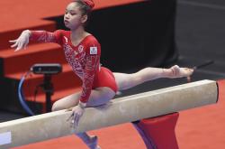 包含比利时体操选手绽放光芒，稳居领先的词条